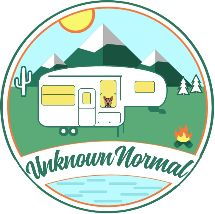 The Unknown Normal logo: a circular badge holding an RV, mountains, water, forest trees and a desert cactus, with the Unknown Normal script across the bottom, in green and orange.